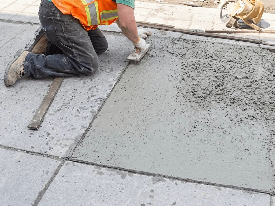Professional repairing a concrete floor in Boulder, CO