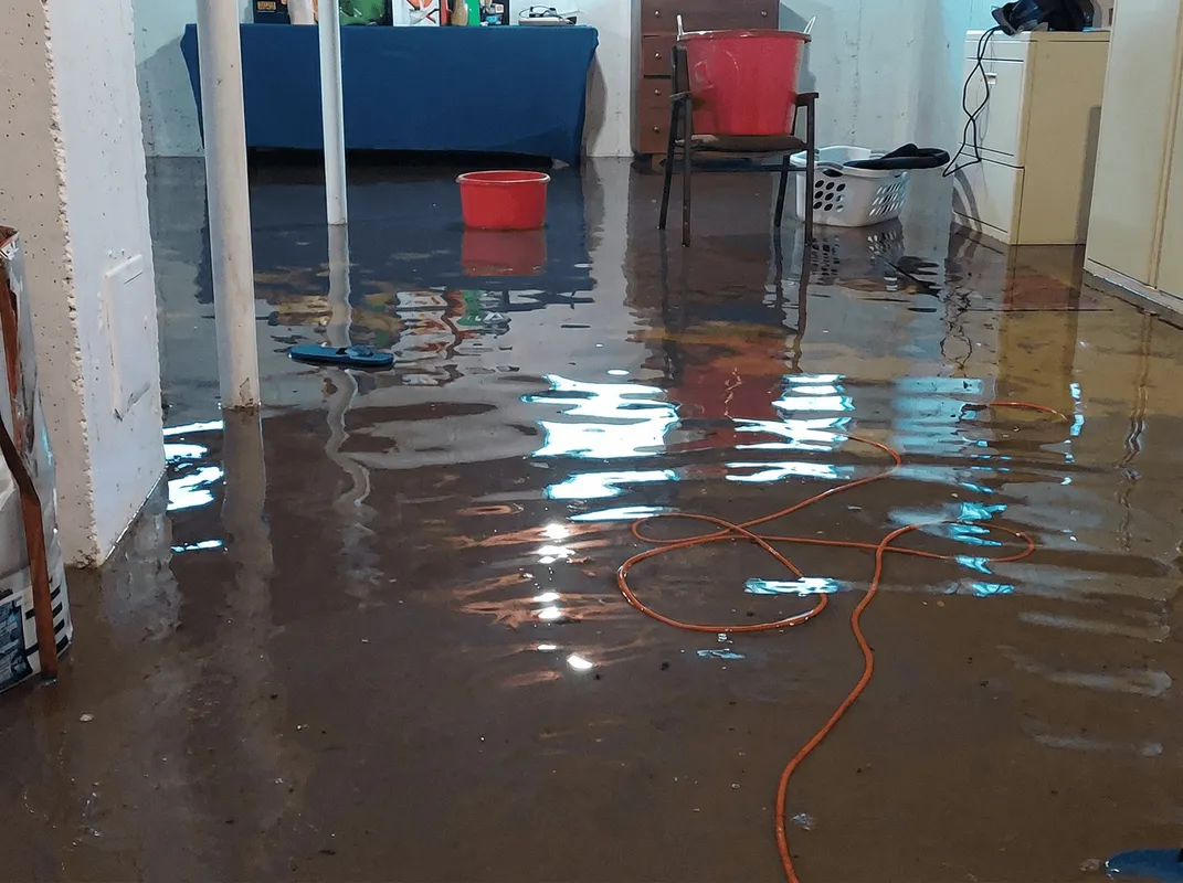 Basement with boiler, cabinets and washing machine completely flooded in Boulder, CO